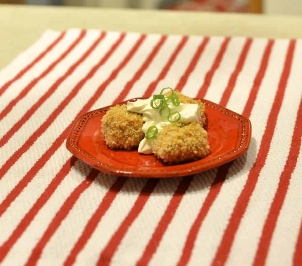 These easy-to-make bite-sized Buffalo Chicken Croquettes are an ideal dish for everyone from fussy foodies to cost-conscious vacationers on the go. Baking the croquettes in the oven is a healthier alternative to frying. One bite will leave you looking for another. If you are looking for a game changer on game day, look no further!
