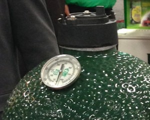 Big Green Egg has announced today the release of the newest offering to it's quiver of cookers. It is called the Mini-Max and it was unveiled today at the Hearth, Patio, and Barbecue Expo in Salt Lake City, UT. For the habitual Big Green Egg enthusiast, one look at the Mini-Max and you can tell some serious thought and work went into this one. The first thing you notice from the exterior is that the thermometer is about twice as large as the thermometers on the current Big Green Egg offerings. A gentleman pointed out to me that his eyesight is not quite as spry as it once was and he already finds the larger thermometer easier to read. When you open the Mini-Max, it has the same cooking area as the Small Big Green Egg, 13 inches in diameter. But what is noticeably different is that the bottom fire grate on the Mini-Max measures 10.5 inches across. In comparison, the bottom fire grate on the Small Big Green Egg measures in about half that size at 5.5 inches. This means more air flow for the Mini-Max and more control over what you are cooking! 