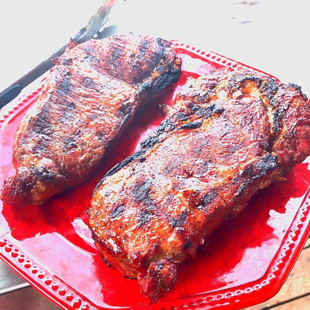 two grilled steaks for steak challenge