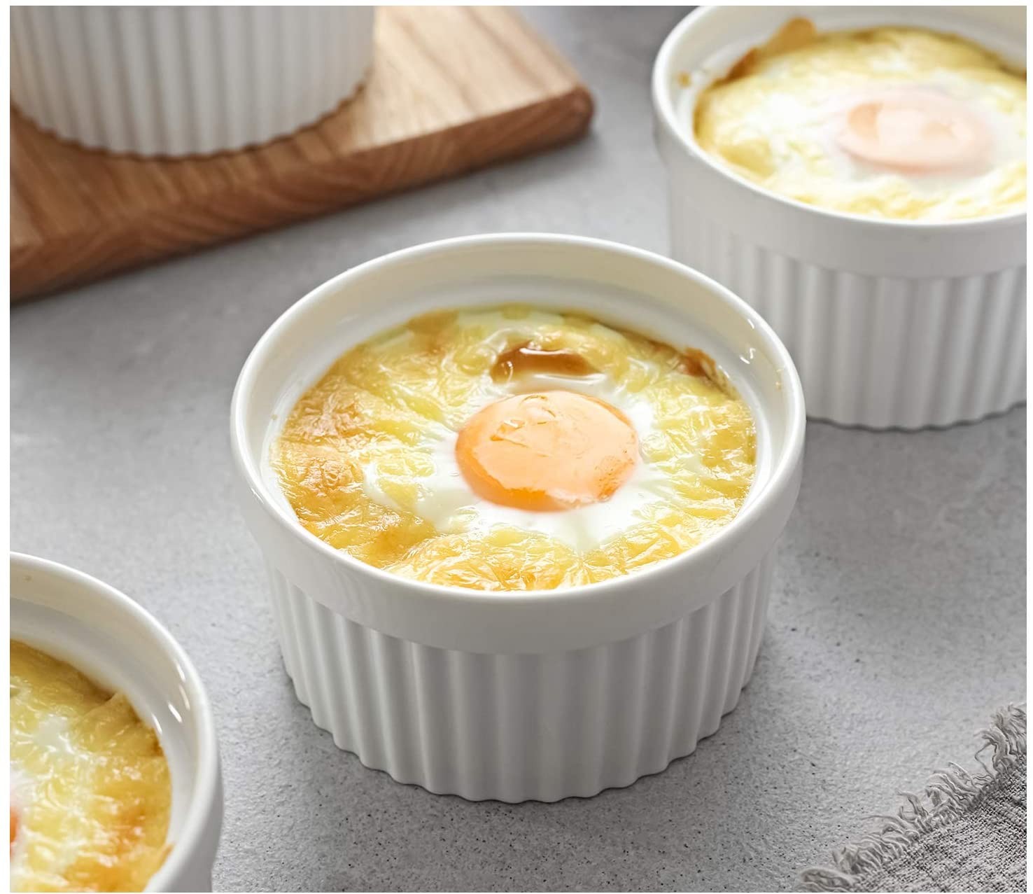A ramekin with cooked egg inside