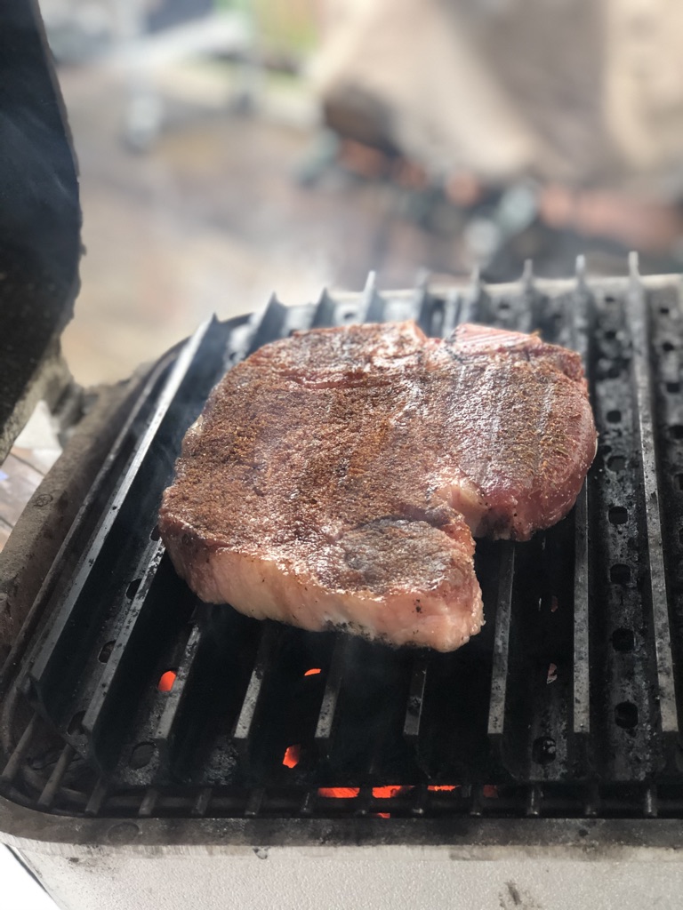 steak cooking with GrillGrates