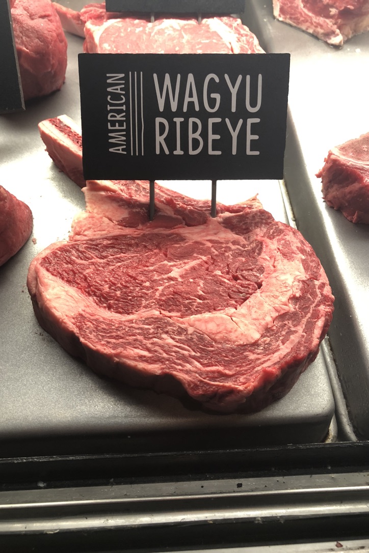 steak in butchers case