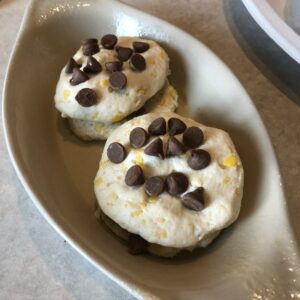chocolate chips on top of biscuits for grilled s' mores