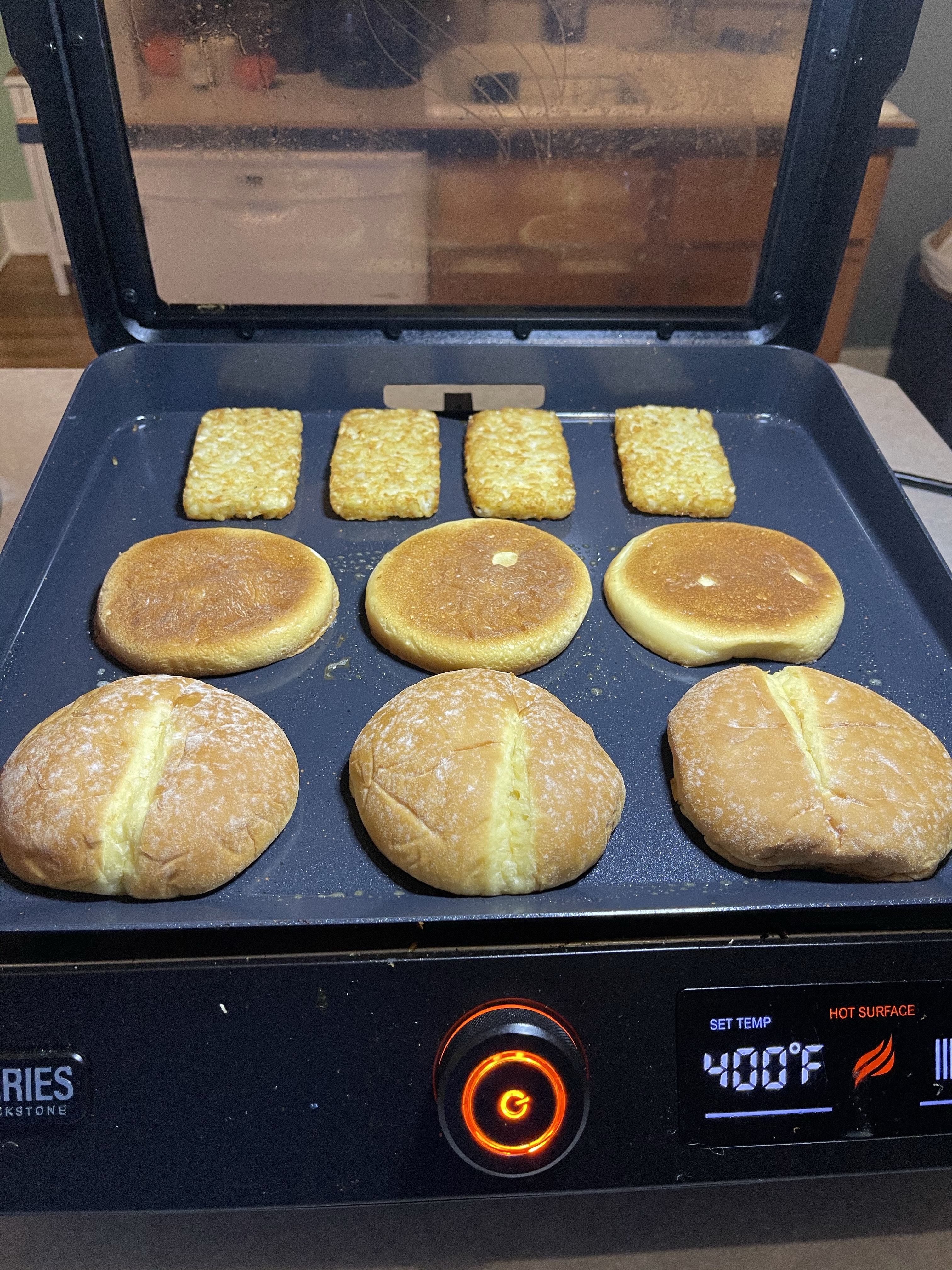 burger buns on griddle