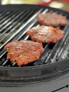 burgers on grill