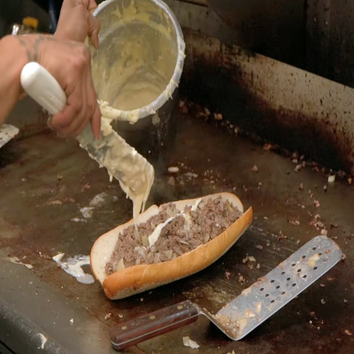 cheesesteak on griddle