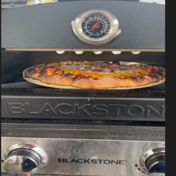 Pizza in Blackstone oven insert.