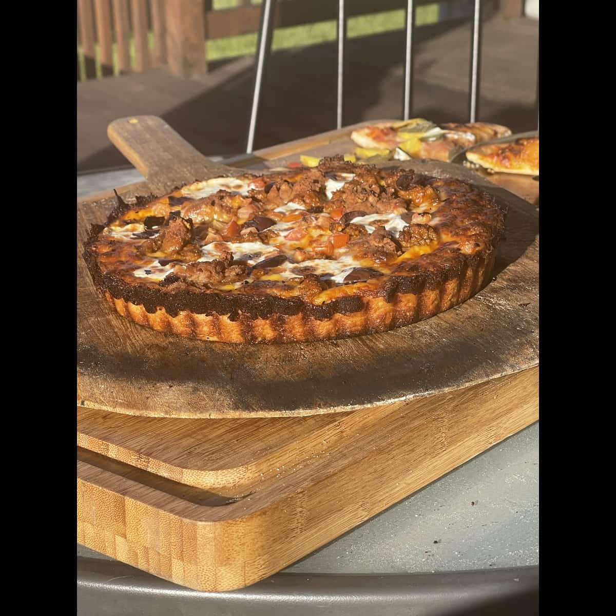 A Cooked taco pizza Detroit Style 