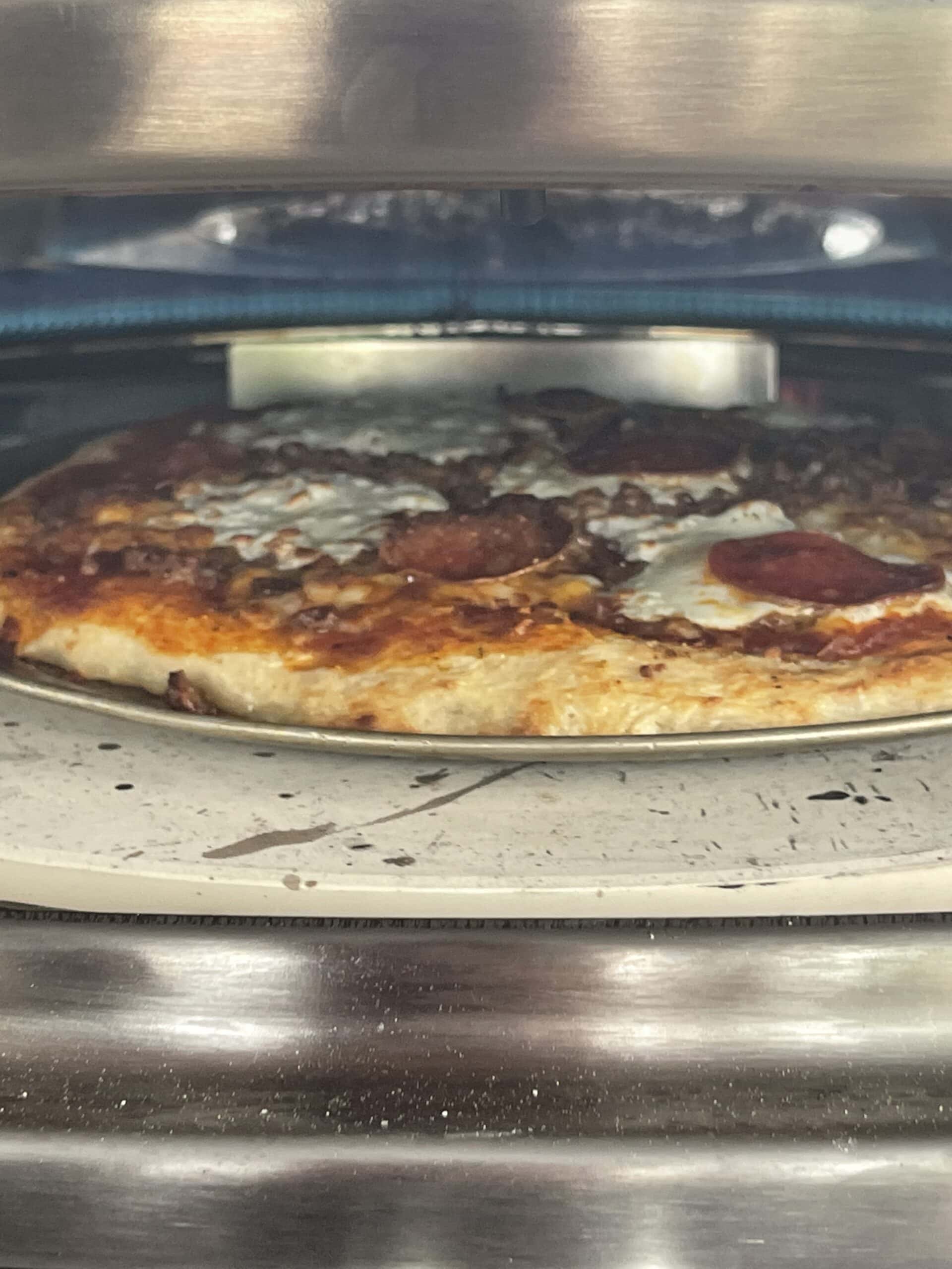 Pizza cooking in the Halo Versa 16 oven