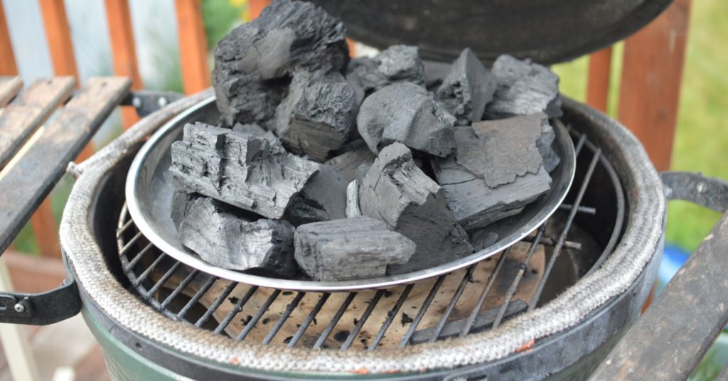 kebabs cooking over hardwood lump charcoal on kamado grill