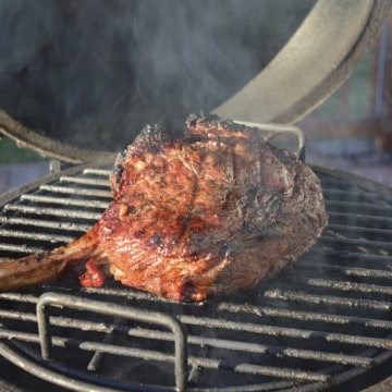 large steak on big green egg grill